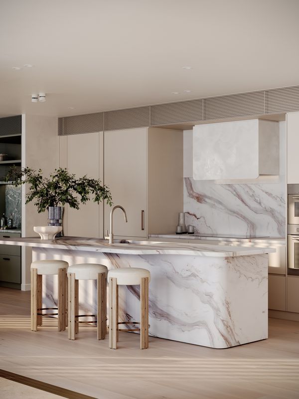 An artist’s impression of the large, modern kitchen of a penthouse apartment at SOL by Walker, featuring a large stone benchtop island.