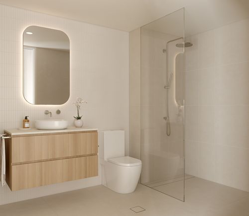 An artist’s impression of a spacious, modern bathroom of an apartment at SOL by Walker, with walk-in shower and other modern fixtures, featuring light tiling and wooden cabinetry.